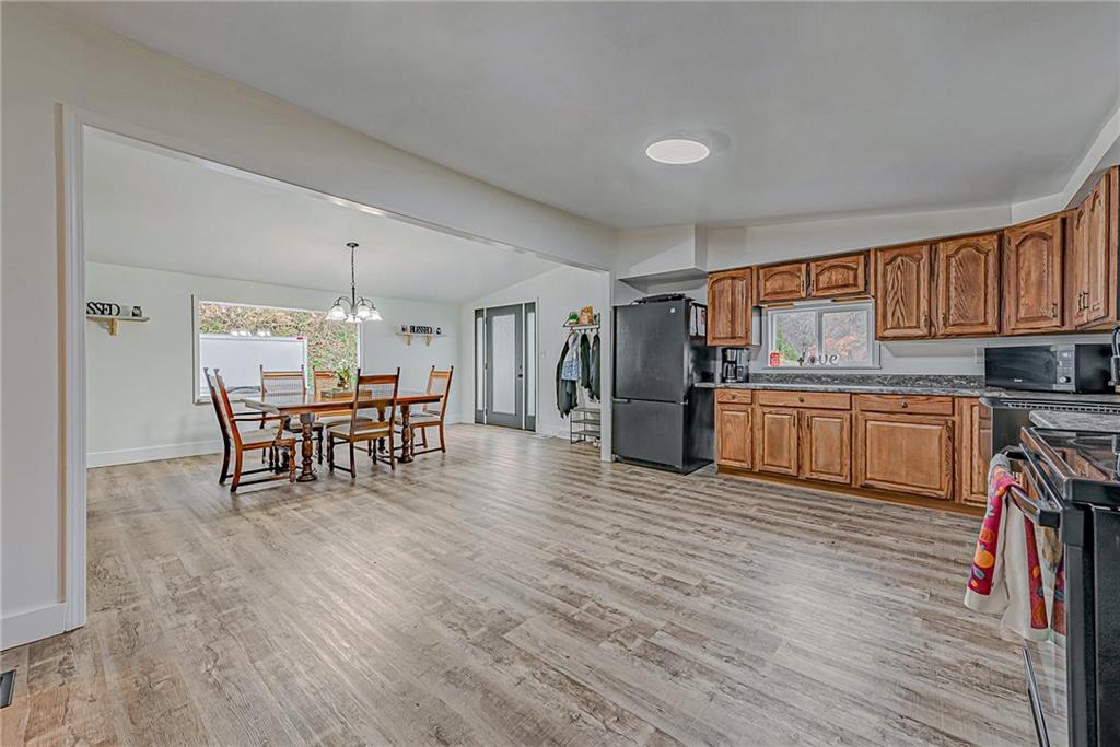 2087 White Cloud Road Leechburg, PA 15656 - Photo 8 of 25 a kitchen with stainless steel appliances a refrigerator and wooden floor