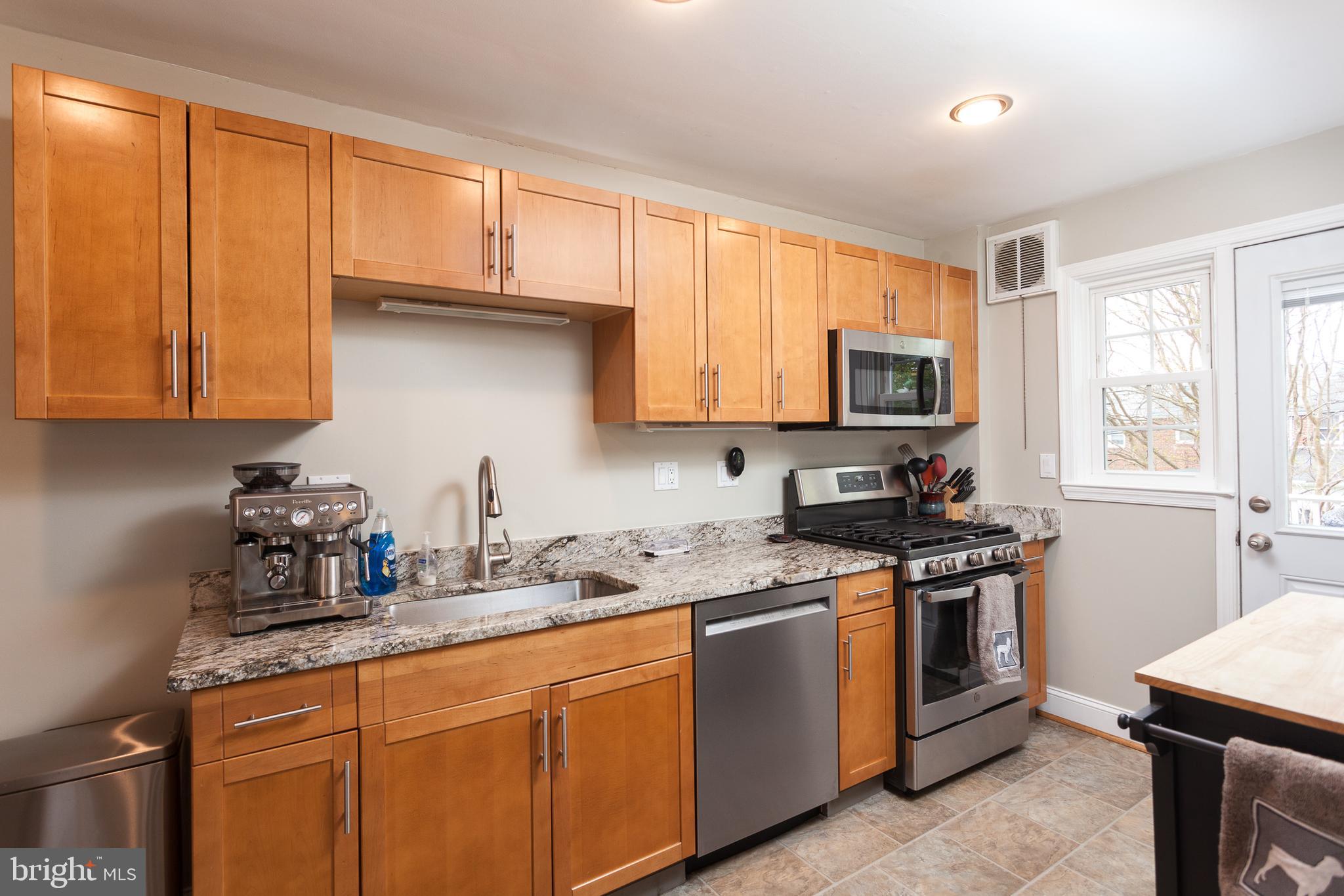 1637 Hardwick Road Towson, MD 21286 - Photo 8 of 25 Updated kitchen with oak cabinets and granite CT's