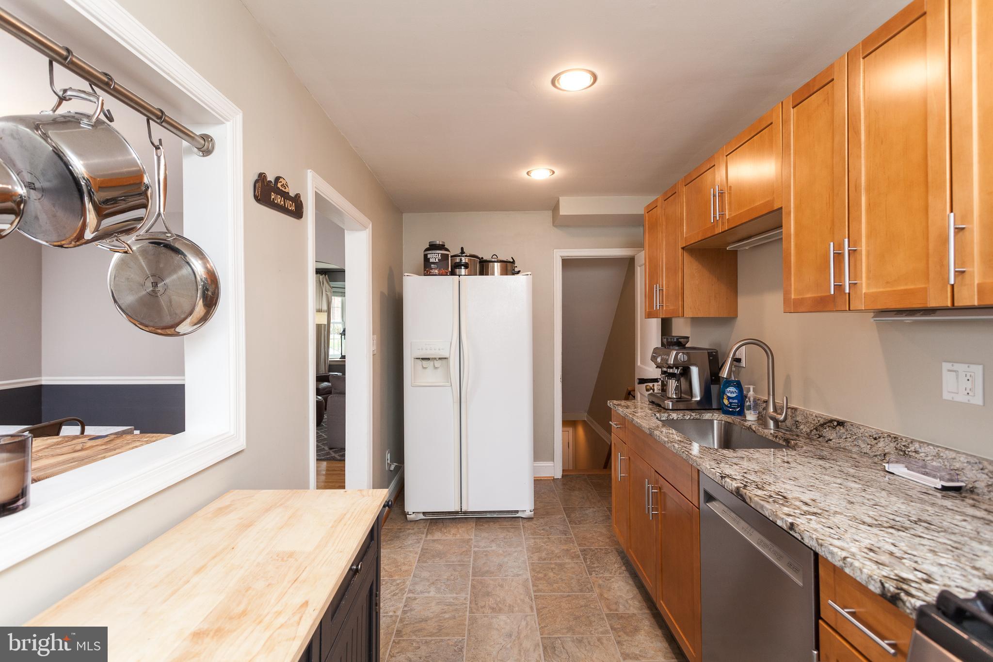 1637 Hardwick Road Towson, MD 21286 - Photo 10 of 25 Serving Hatch in the kitchen gives an open concept