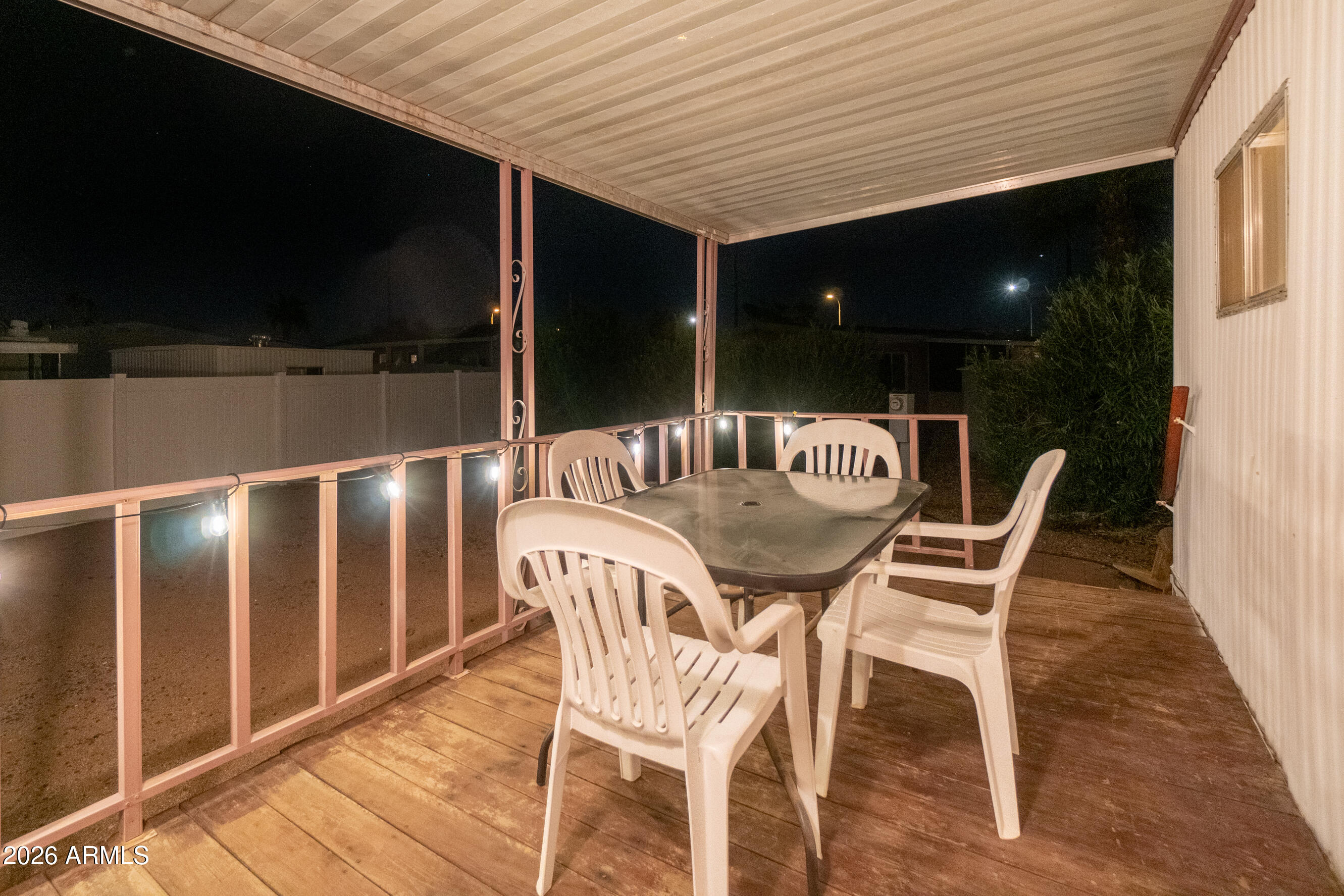 201 South Greenfield Road, Unit 361 Mesa, AZ 85206 - Photo 36 of 53 a view of balcony with table and chairs