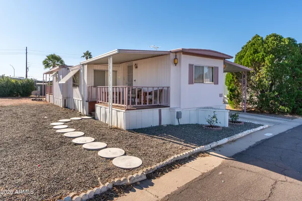 a front view of a house with yard