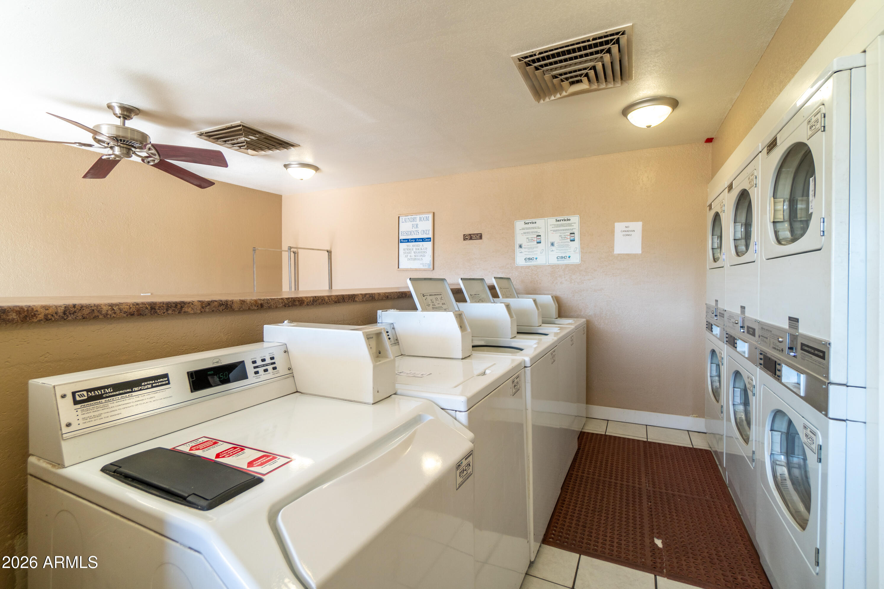201 South Greenfield Road, Unit 361 Mesa, AZ 85206 - Photo 49 of 53 a living room with furniture and a fireplace