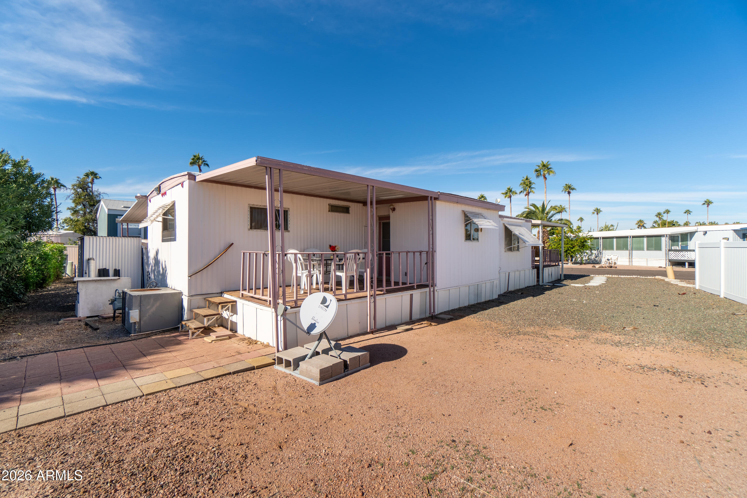 201 South Greenfield Road, Unit 361 Mesa, AZ 85206 - Photo 5 of 53 a view of a house with patio