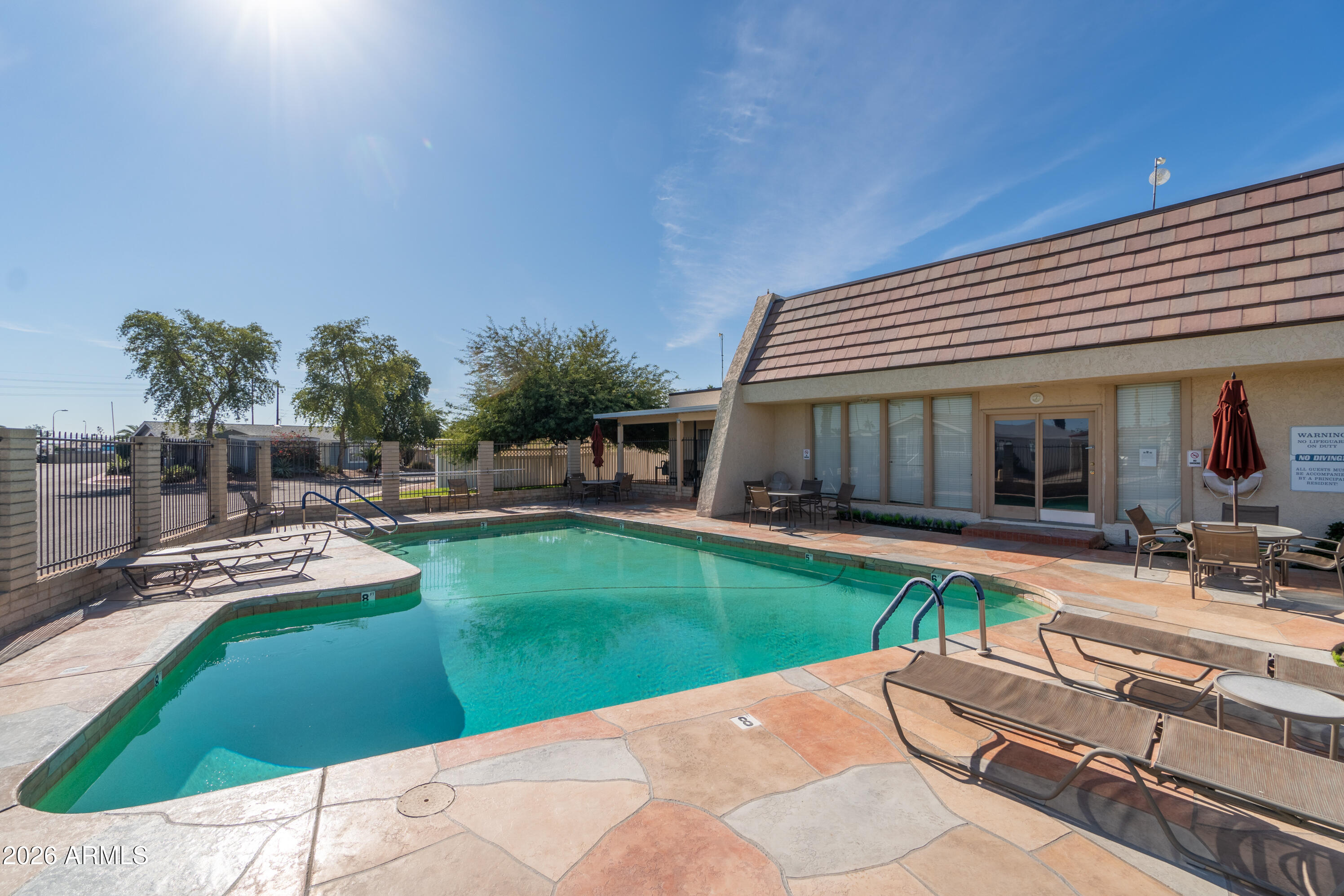 201 South Greenfield Road, Unit 361 Mesa, AZ 85206 - Photo 53 of 53 a view of a house with backyard sitting area and garden