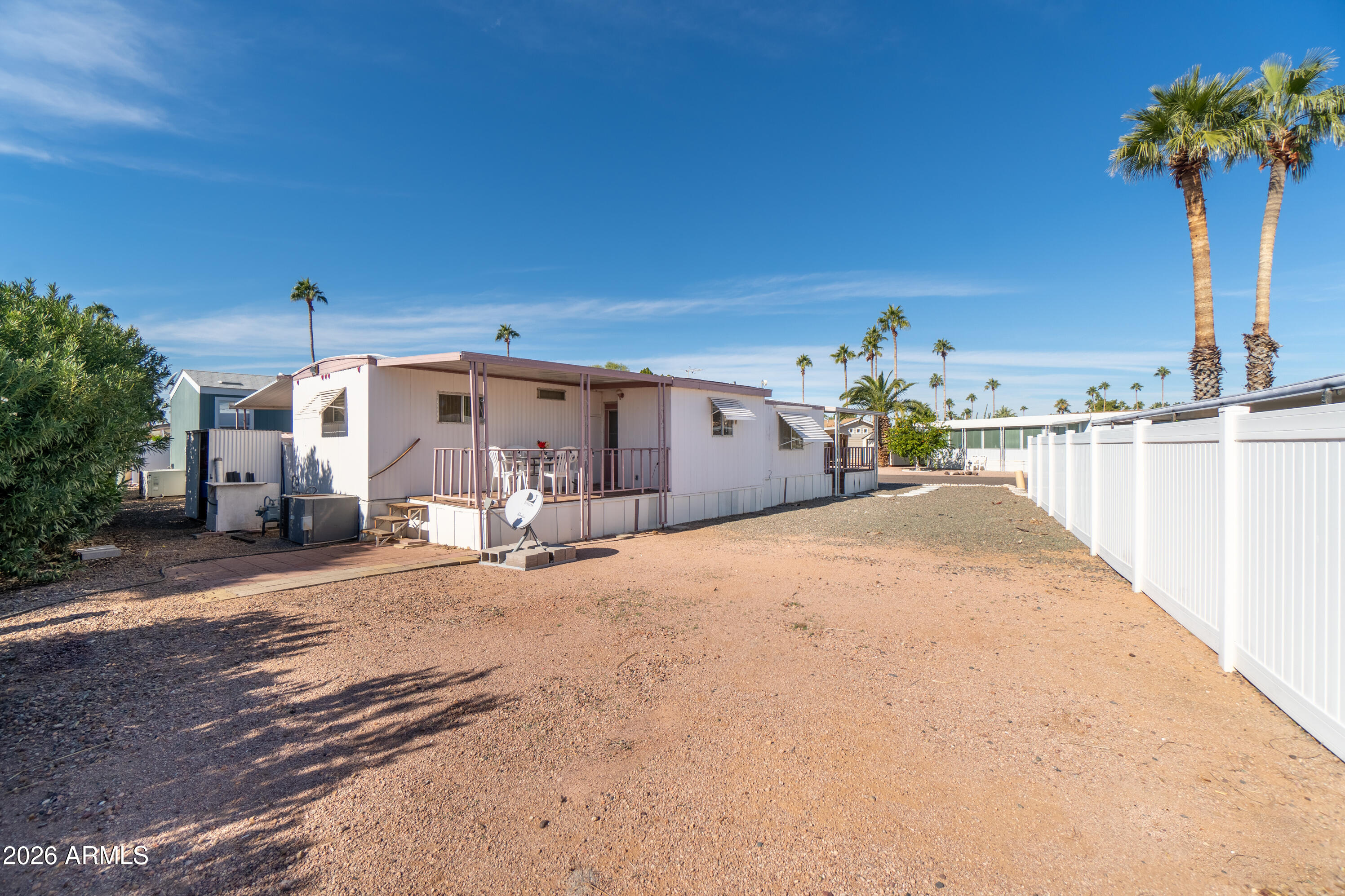 201 South Greenfield Road, Unit 361 Mesa, AZ 85206 - Photo 6 of 53 a view of a house with a patio