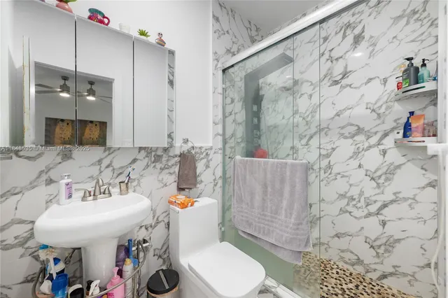 a view of a house with a yard and garage