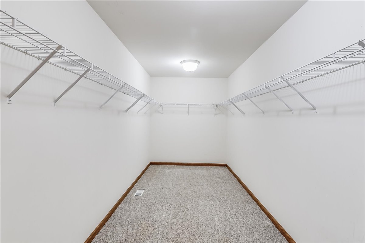 600 Spring Drive Marengo, IL 60152 - Photo 17 of 28 an empty room with a empty shelves