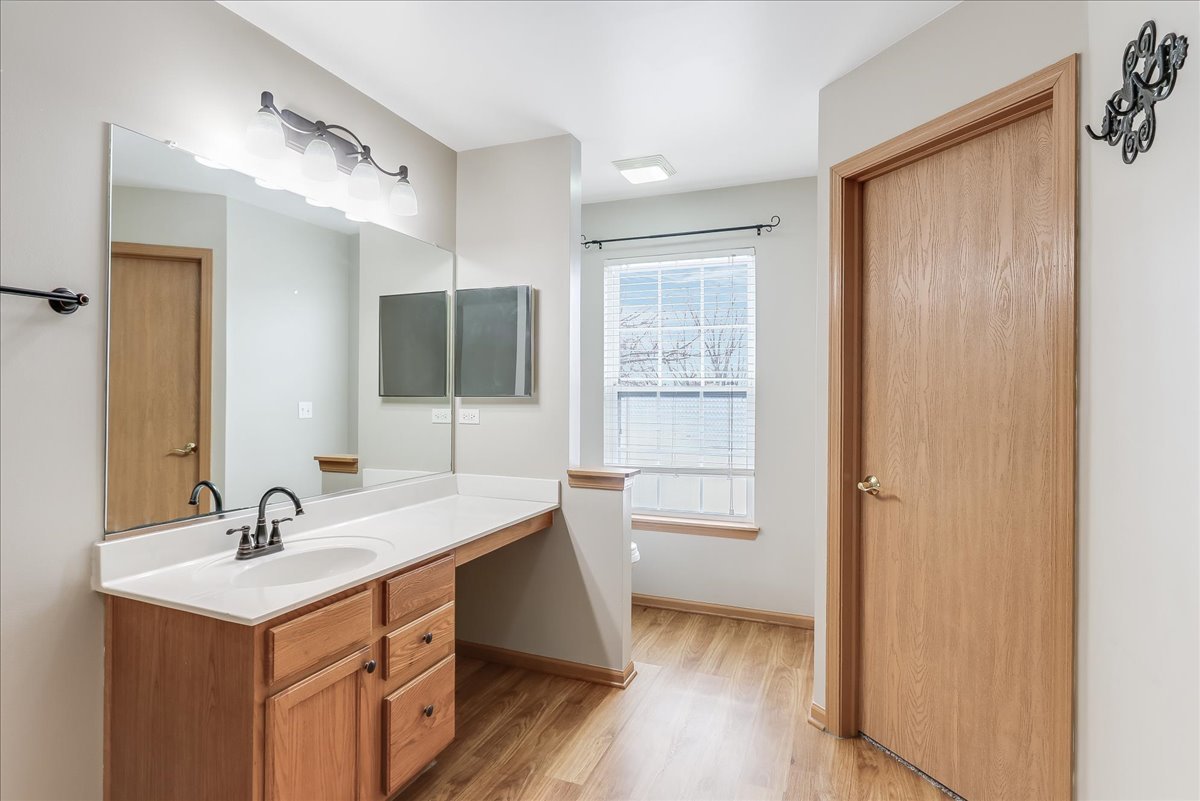 600 Spring Drive Marengo, IL 60152 - Photo 18 of 28 a bathroom with a sink and a mirror