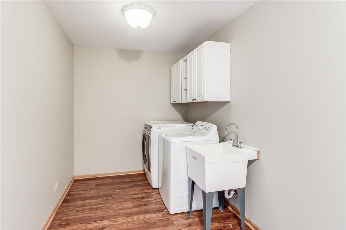 600 Spring Drive Marengo, IL 60152 - Photo 24 of 28 a view of hallway with washer and dryer