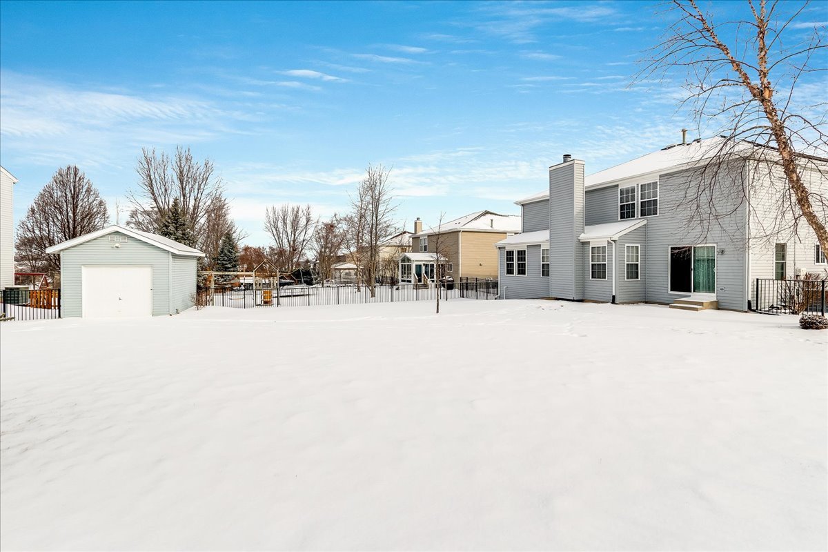 600 Spring Drive Marengo, IL 60152 - Photo 25 of 28 a view of city street with a houses