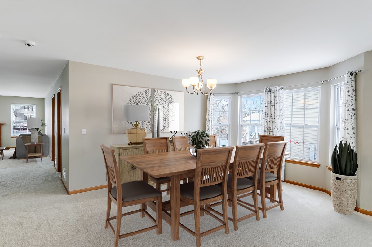 600 Spring Drive Marengo, IL 60152 - Photo 3 of 28 a view of a dining room with furniture and window