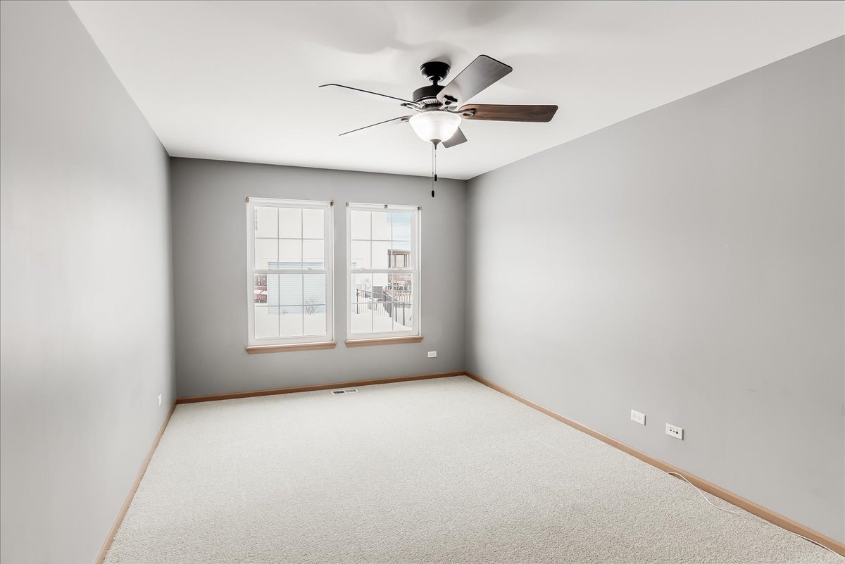 600 Spring Drive Marengo, IL 60152 - Photo 10 of 28 an empty room with a window