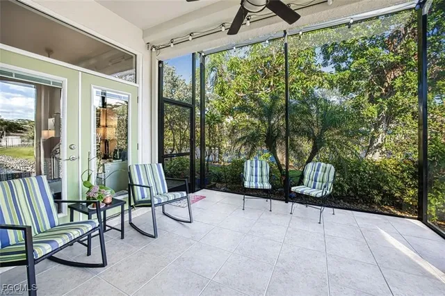 a view of a patio with a table and chairs