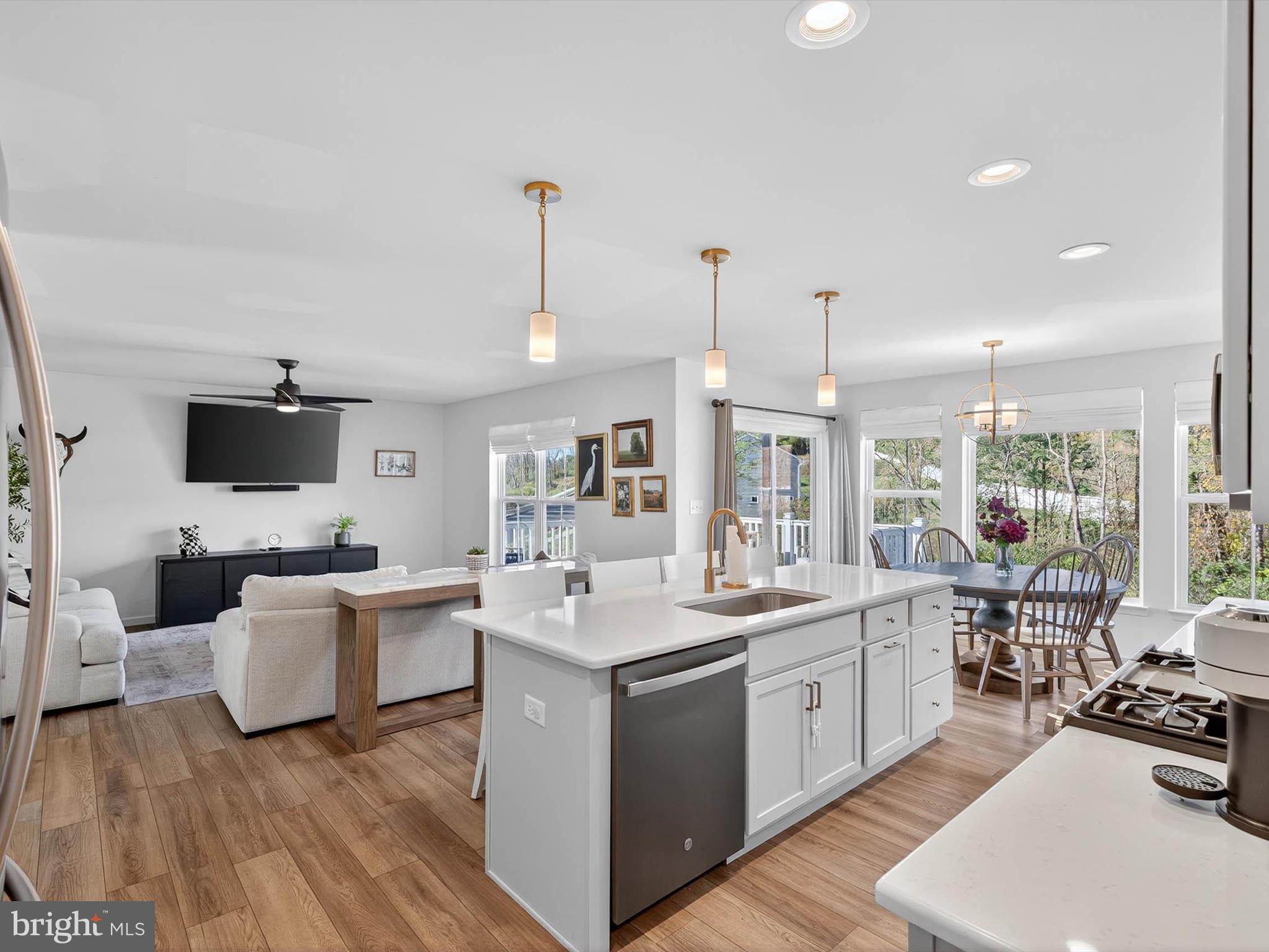 29 Ladderback Lane Reading, PA 19606 - Photo 16 of 60 a large white kitchen with a large window and stainless steel appliances