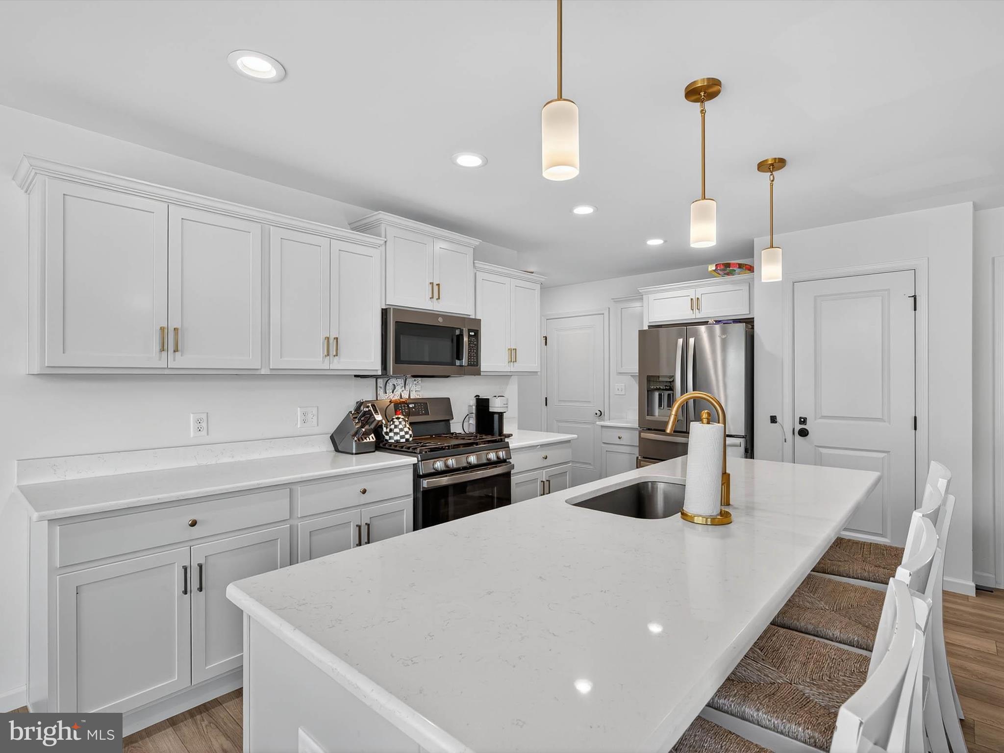 29 Ladderback Lane Reading, PA 19606 - Photo 18 of 60 a kitchen with sink a stove and refrigerator