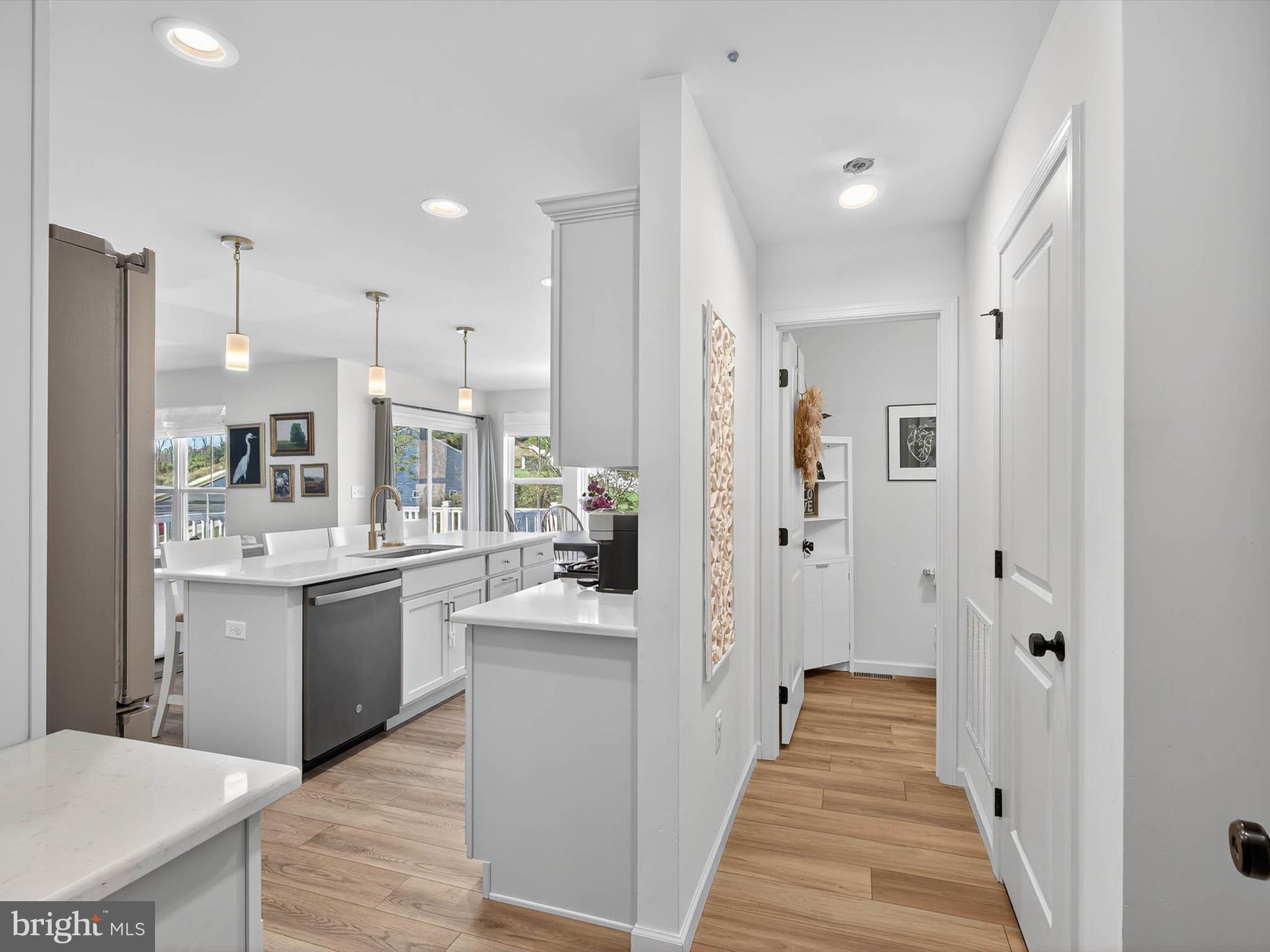 29 Ladderback Lane Reading, PA 19606 - Photo 22 of 60 a large white kitchen with white cabinets and stainless steel appliances