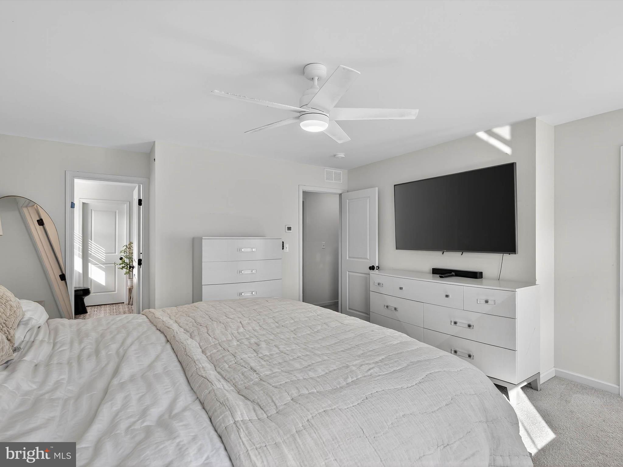 29 Ladderback Lane Reading, PA 19606 - Photo 32 of 60 a bedroom with a bed and a flat screen tv