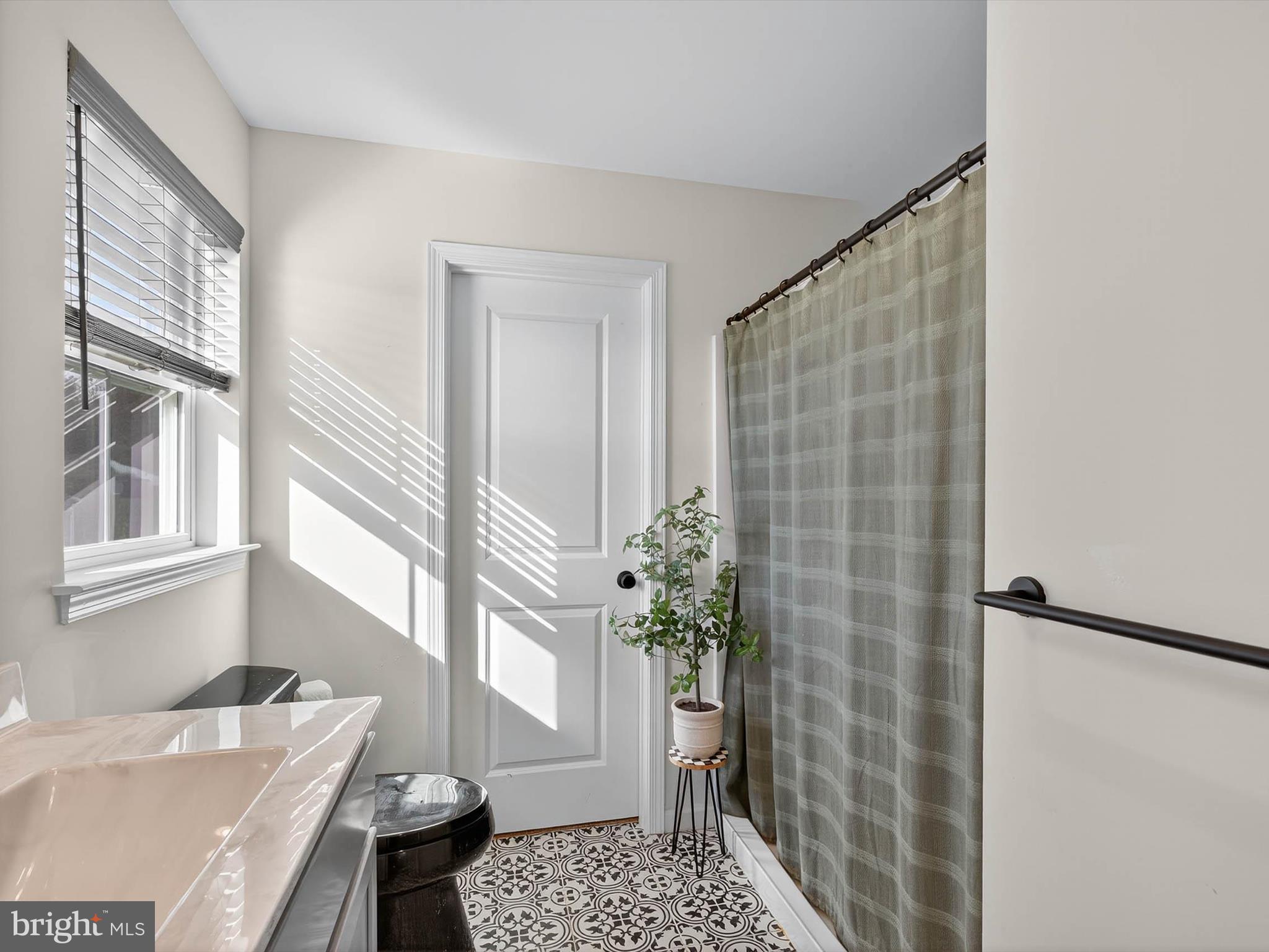 29 Ladderback Lane Reading, PA 19606 - Photo 34 of 60 a bathroom with a sink and a mirror