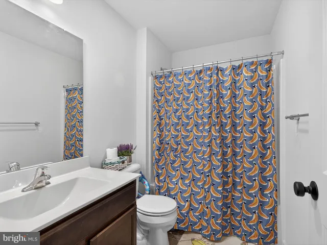 a view of storage and utility room with washer and dryer