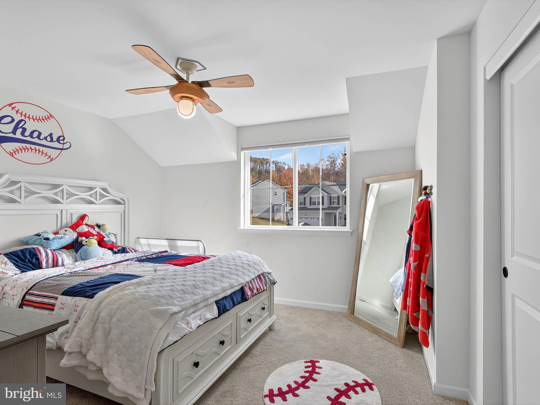 29 Ladderback Lane Reading, PA 19606 - Photo 40 of 60 a bedroom with a bed and a chandelier