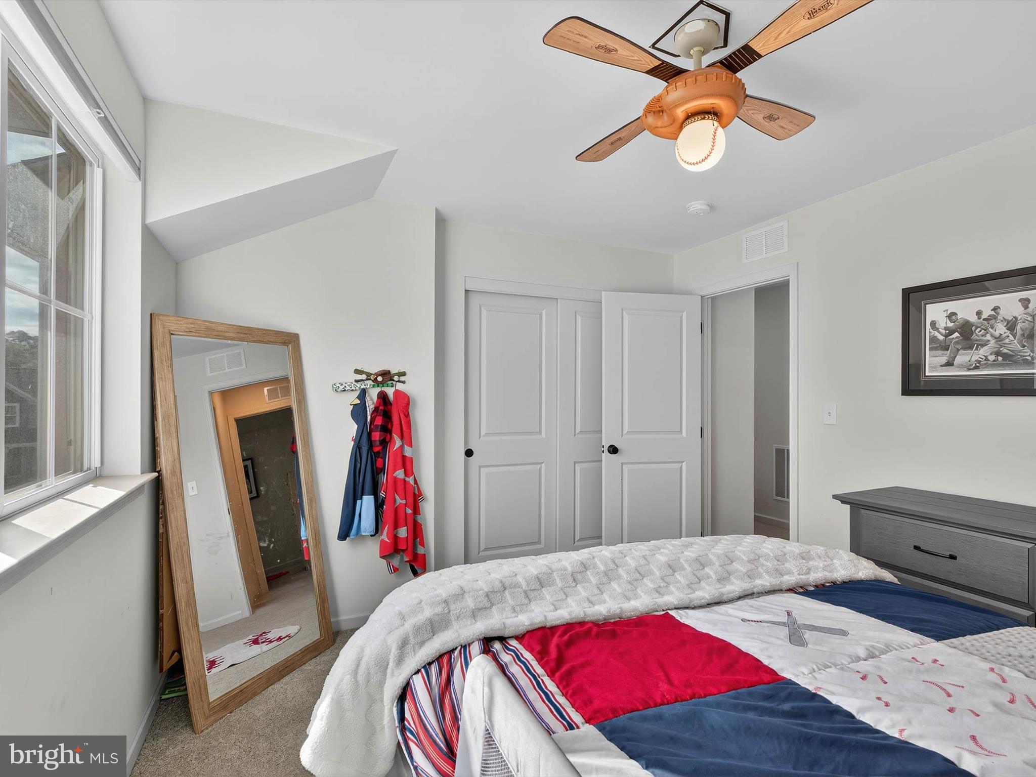 29 Ladderback Lane Reading, PA 19606 - Photo 41 of 60 a bedroom with a bed and a chandelier