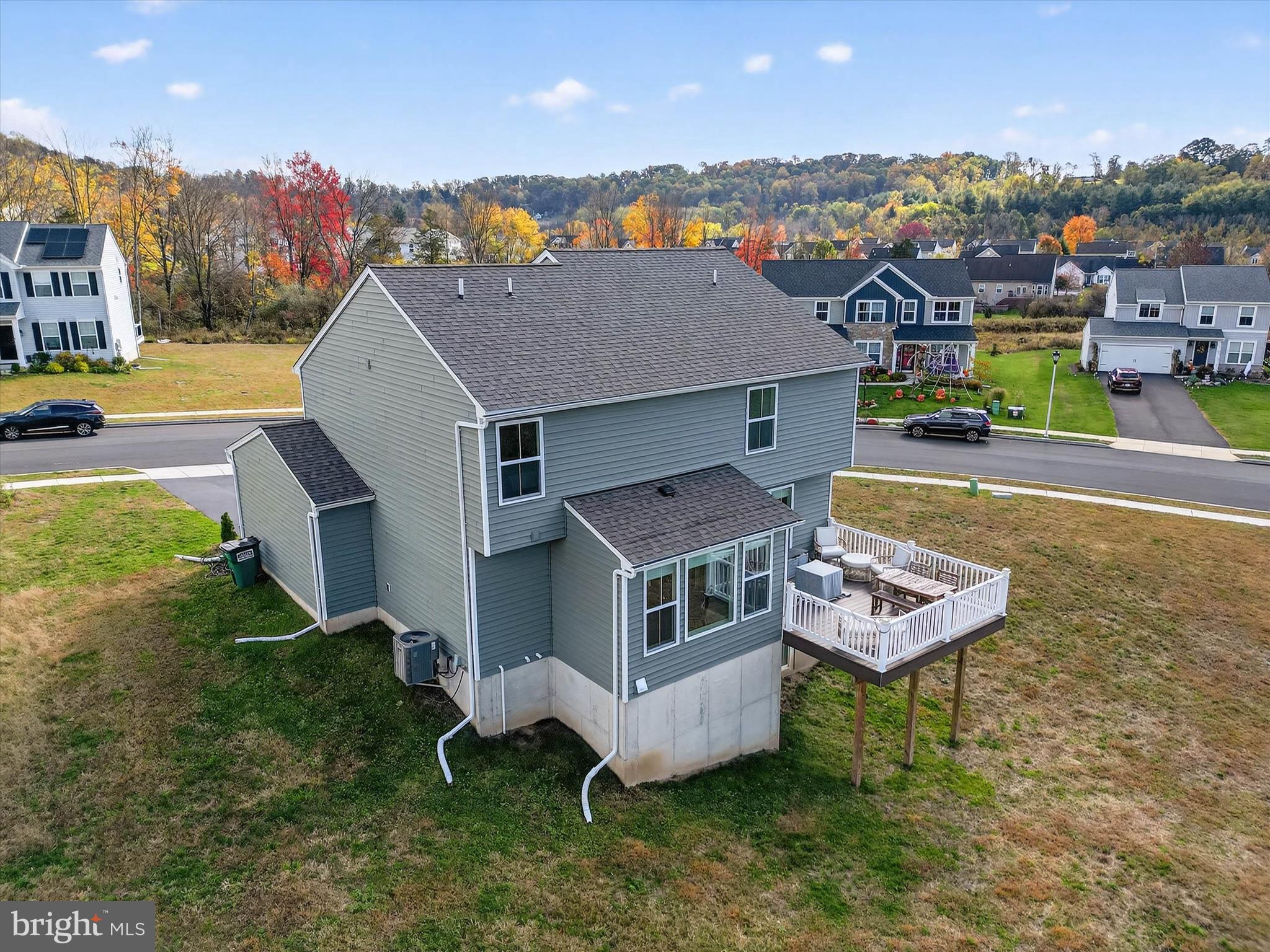 29 Ladderback Lane Reading, PA 19606 - Photo 45 of 60 an aerial view of a house with a garden and deck