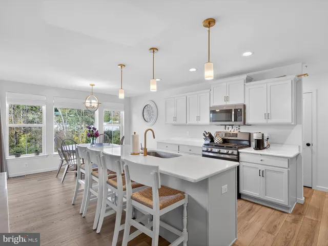 a view of livingroom with furniture and stairs
