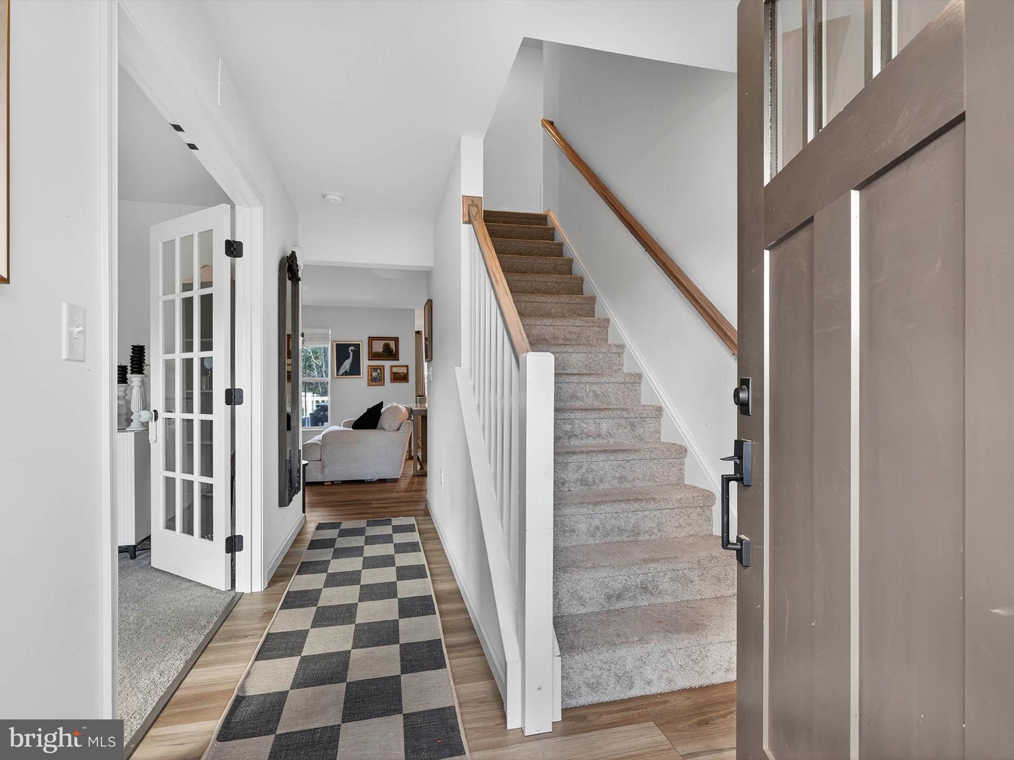29 Ladderback Lane Reading, PA 19606 - Photo 10 of 60 a view of a hallway with wooden floor and staircase