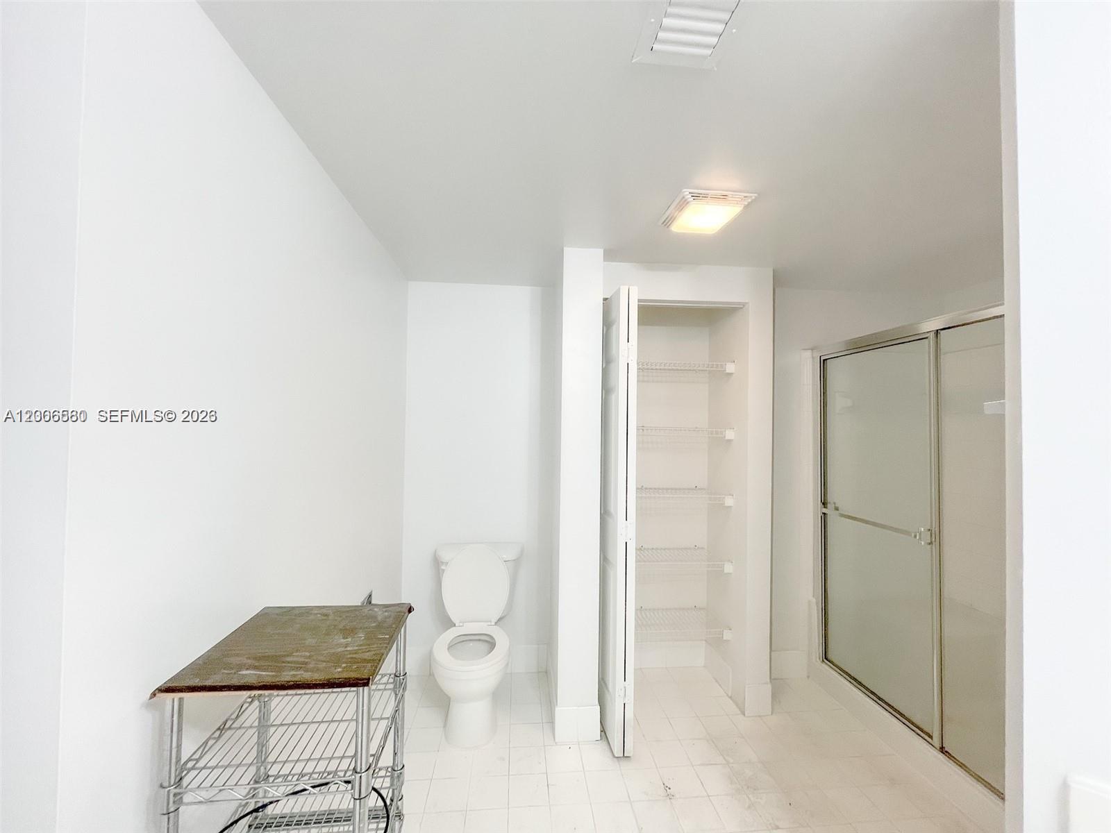 17150 North Bay Road, Unit 2602 Sunny Isles Beach, FL 33160 - Photo 25 of 27 a bathroom with a toilet