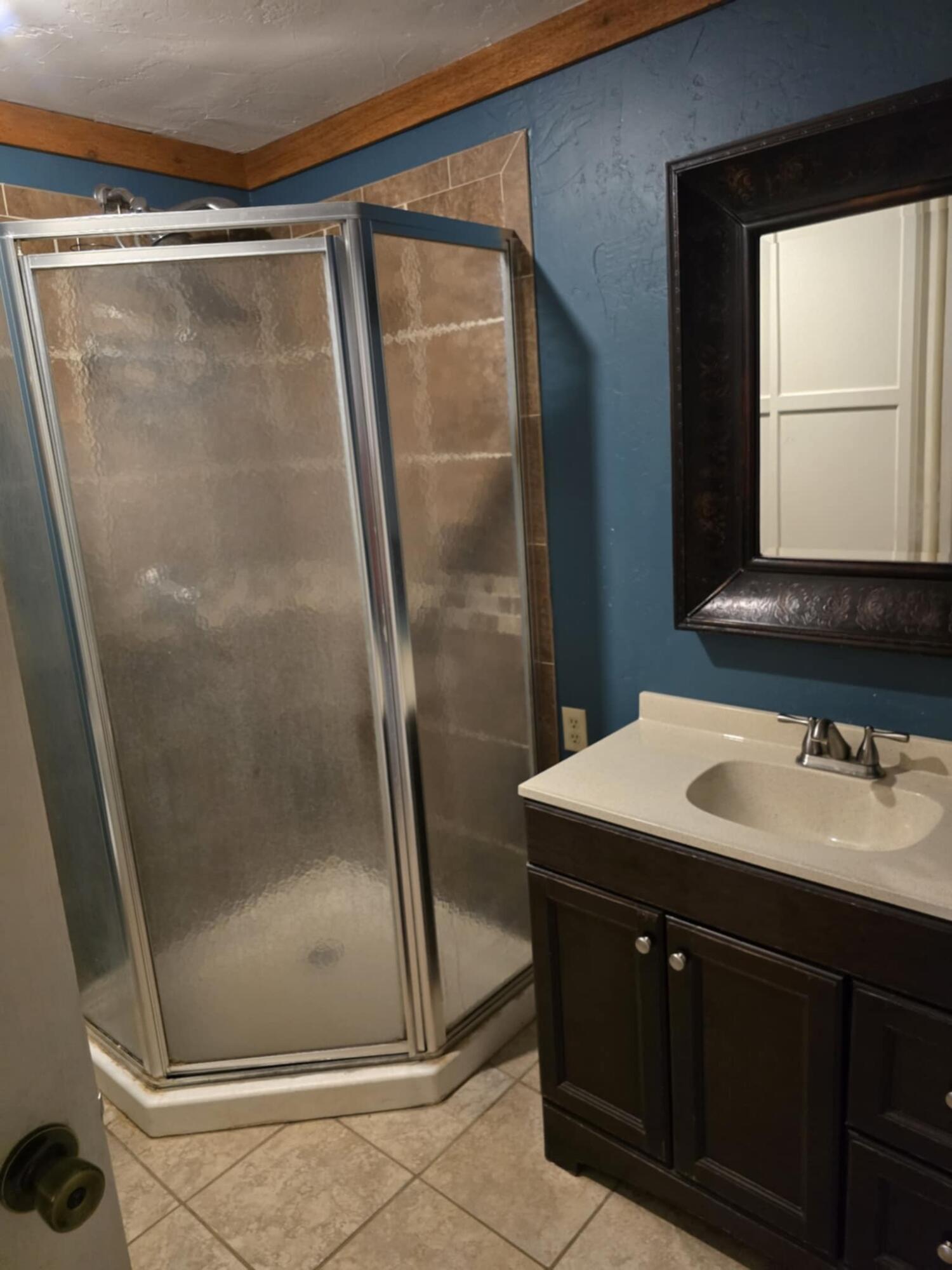 640 Fm 168 Olton, TX 79064 - Photo 23 of 30 a bathroom with a sink and a mirror