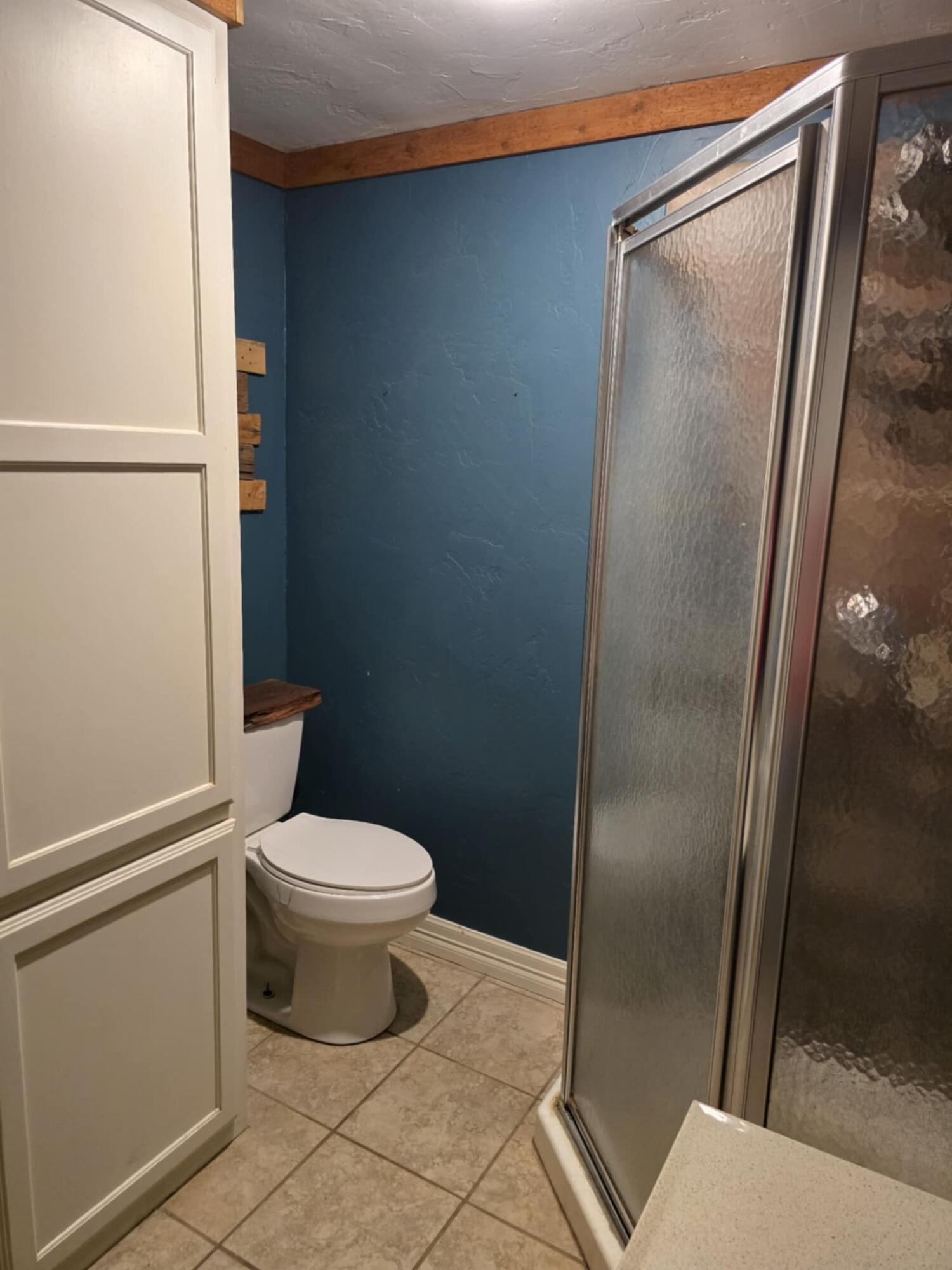 640 Fm 168 Olton, TX 79064 - Photo 24 of 30 a white toilet sitting next to a bathroom sink