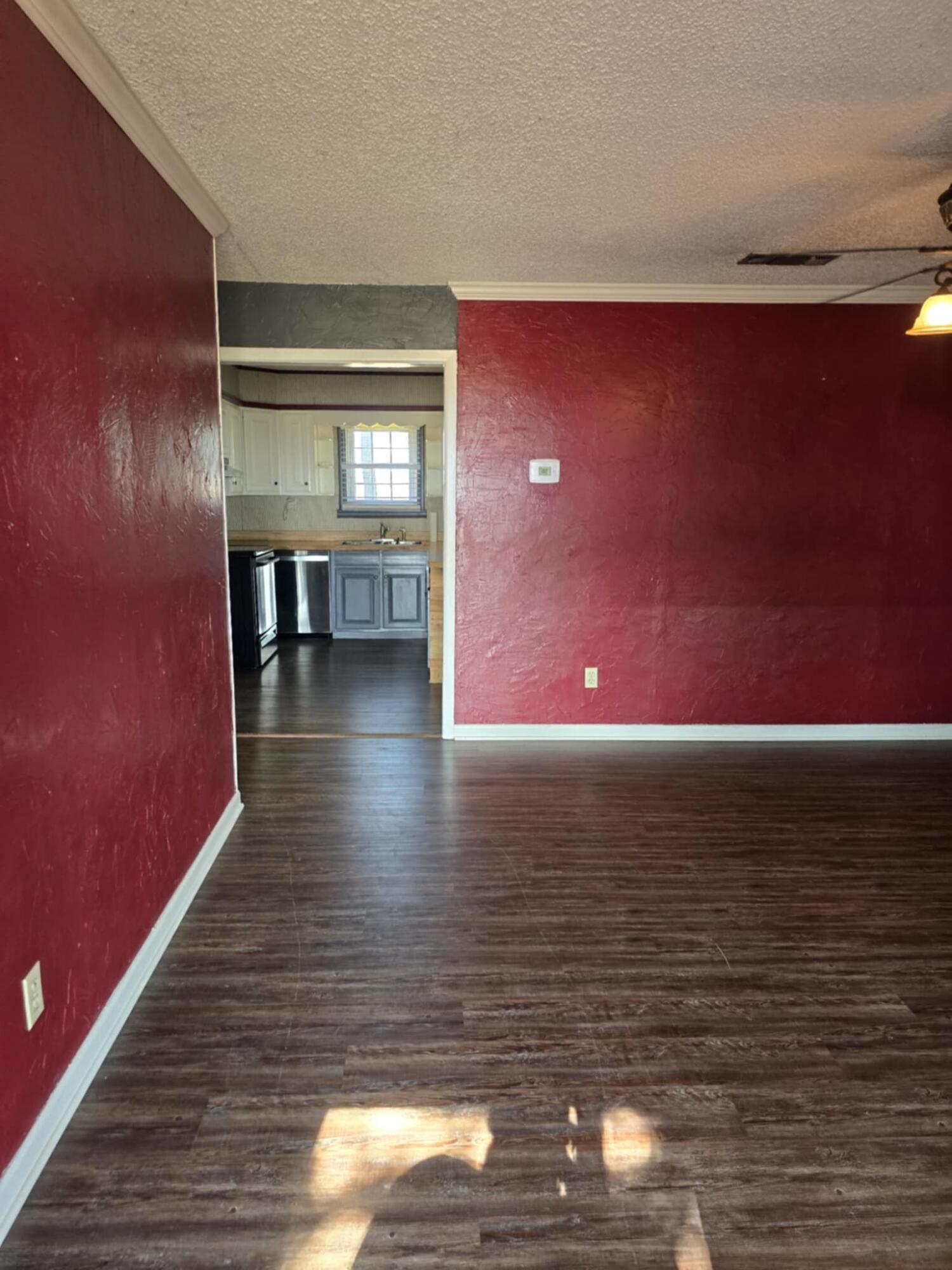 640 Fm 168 Olton, TX 79064 - Photo 3 of 30 a view of a room with wooden floor