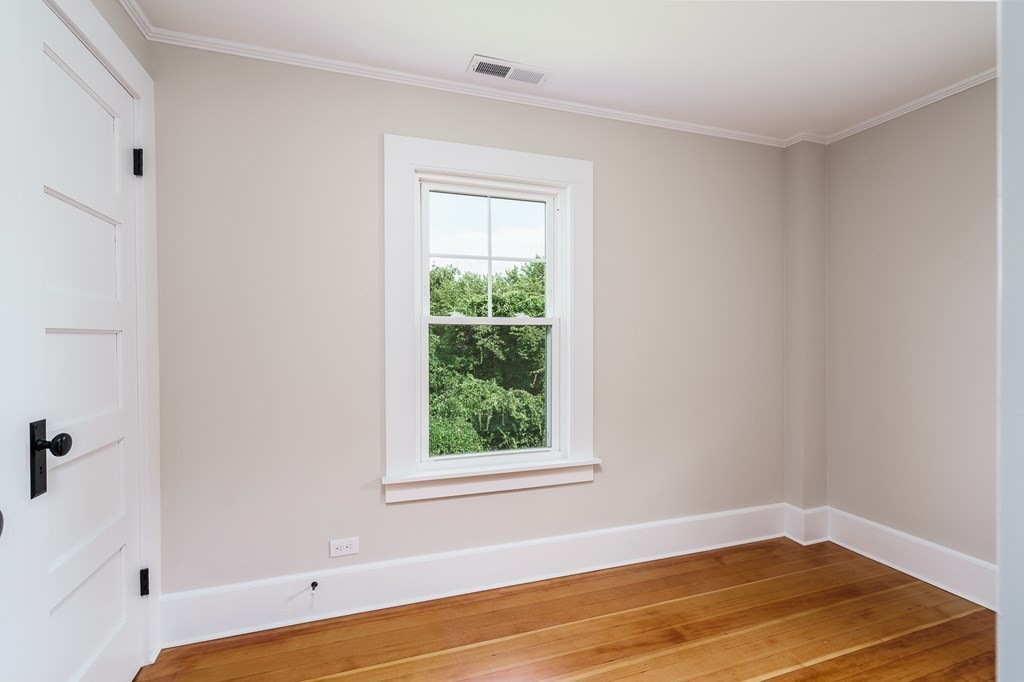 69 High Street Southampton, MA 01073 - Photo 38 of 42 a view of a room with wooden floor and small window
