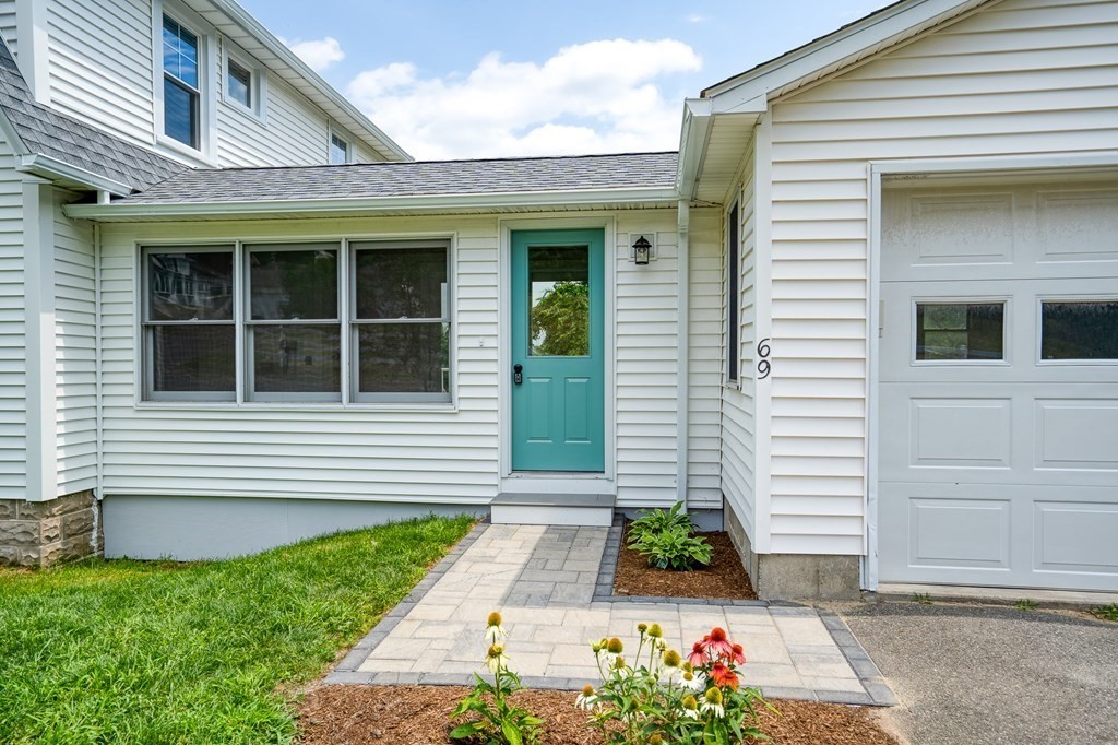 69 High Street Southampton, MA 01073 - Photo 6 of 42 a front view of a house with garden