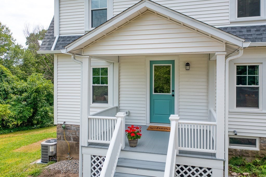 69 High Street Southampton, MA 01073 - Photo 7 of 42 a front view of a house with outdoor seating