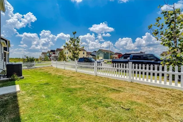 a view of a house with swimming pool