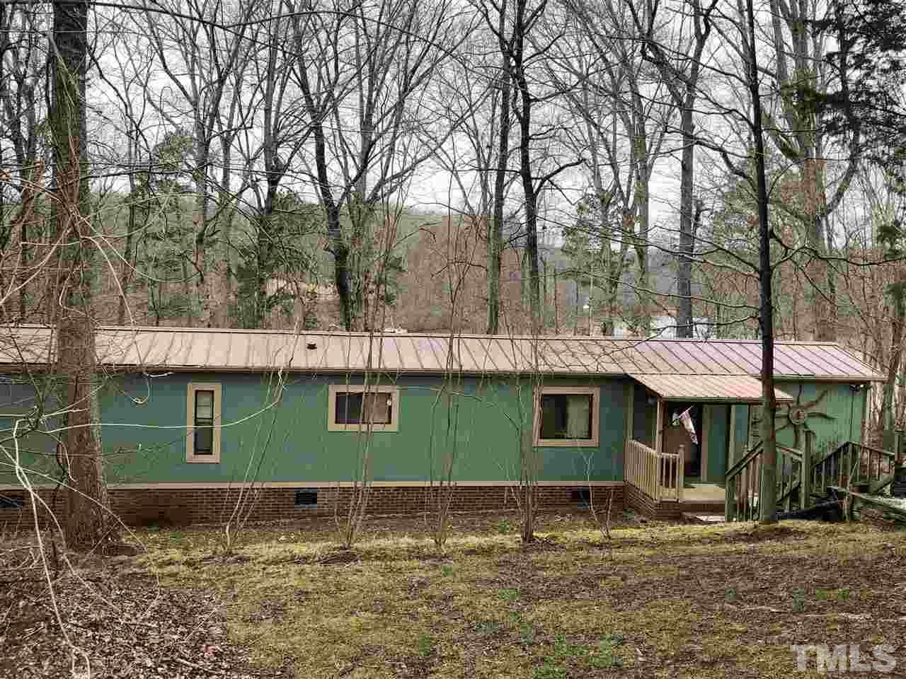 6119 Virgilina Road Roxboro, NC 27574 - Photo 2 of 11 a front view of a house