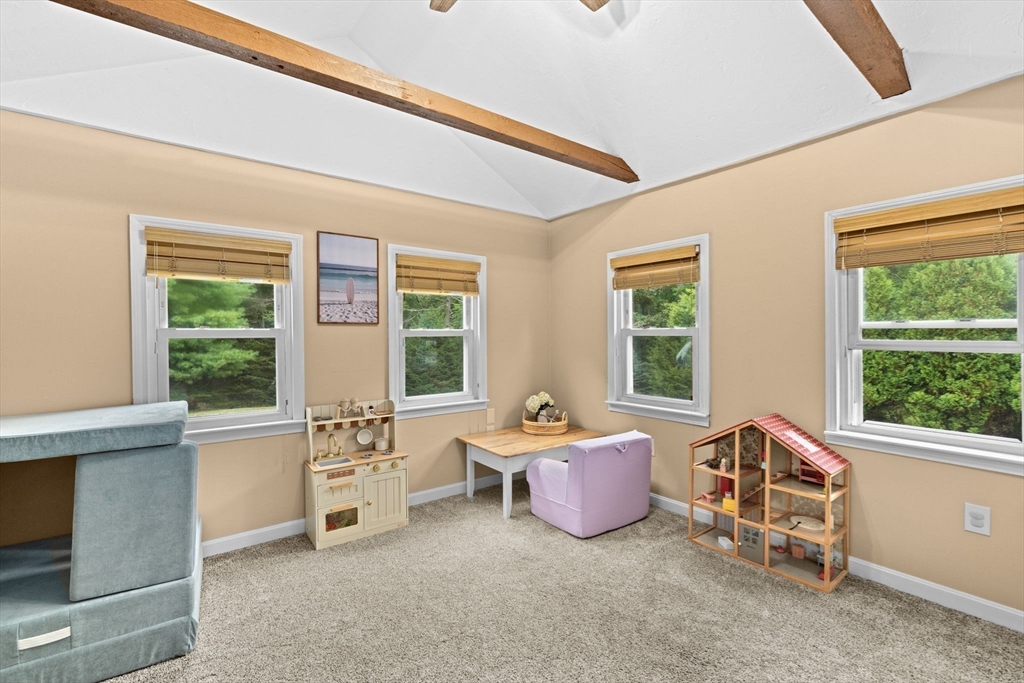 983 Webster Street Hanover, MA 02339 - Photo 16 of 41 a living room with furniture and windows