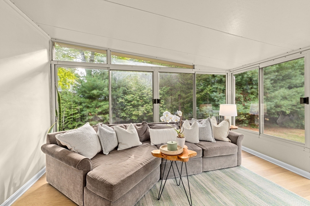 983 Webster Street Hanover, MA 02339 - Photo 20 of 41 a living room with furniture and a large window