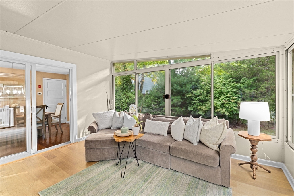 983 Webster Street Hanover, MA 02339 - Photo 21 of 41 a living room with furniture and a large window