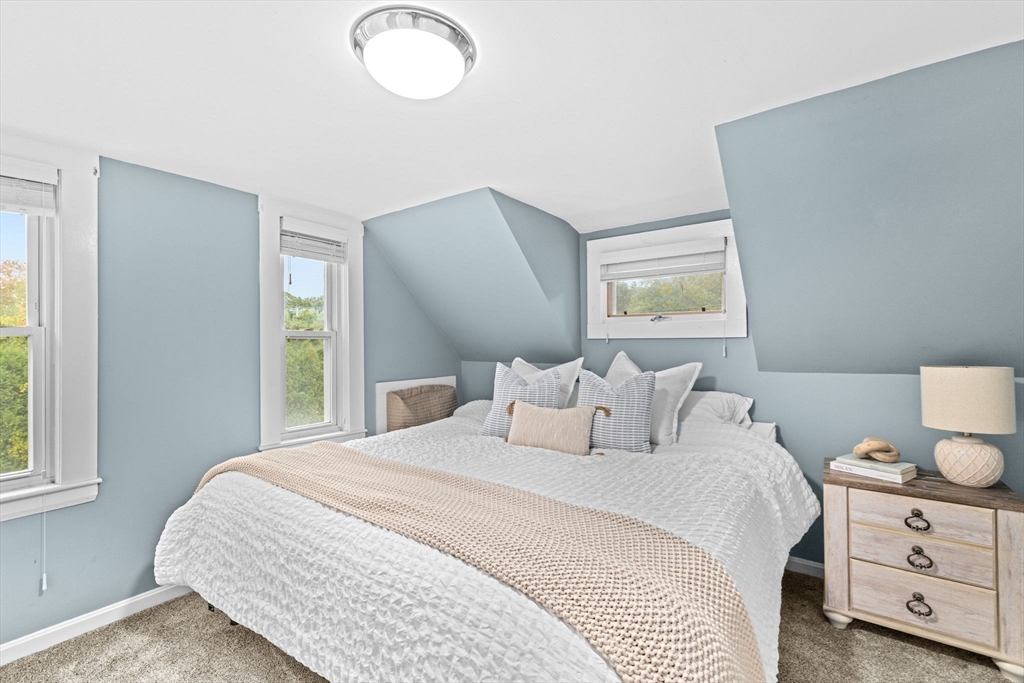 983 Webster Street Hanover, MA 02339 - Photo 26 of 41 a bedroom with a bed and a window