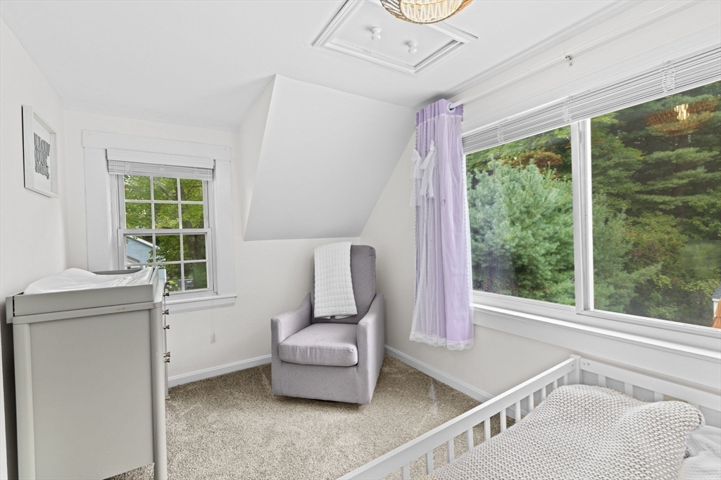 983 Webster Street Hanover, MA 02339 - Photo 29 of 41 a living room with furniture and a window