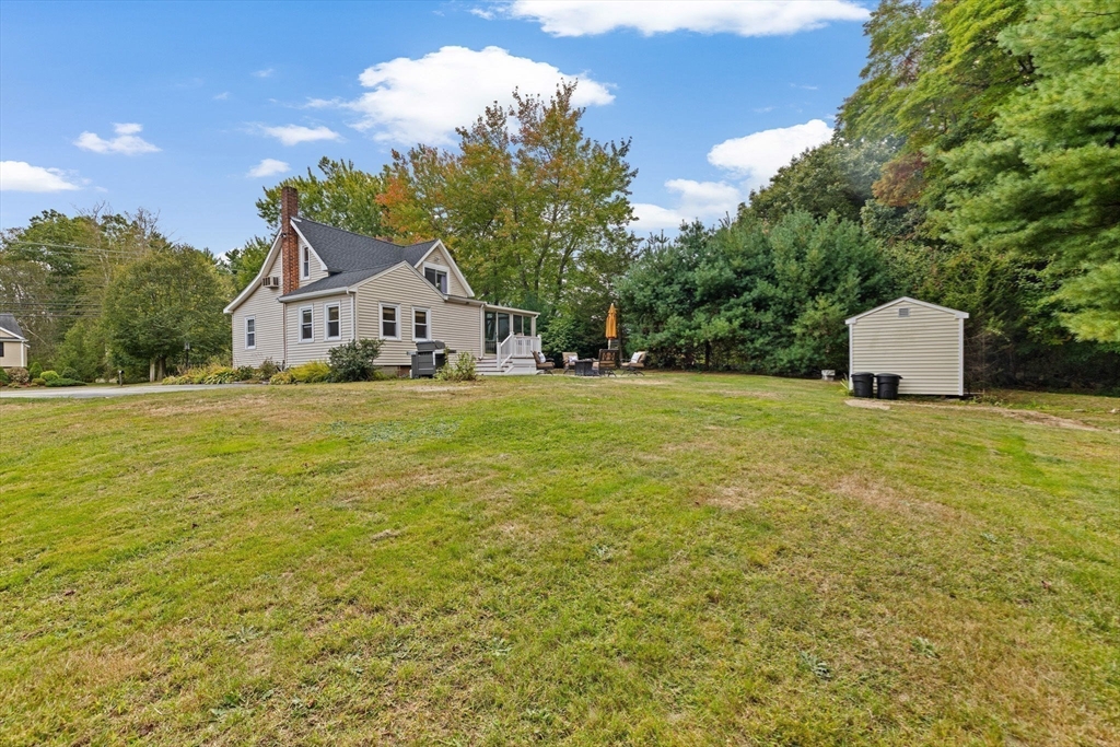983 Webster Street Hanover, MA 02339 - Photo 32 of 41 a house with a garden