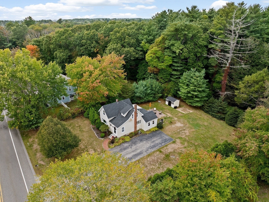 983 Webster Street Hanover, MA 02339 - Photo 37 of 41 an aerial view of a house with a yard
