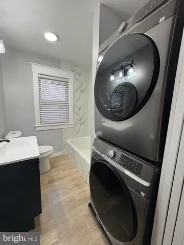 a bathroom with a toilet and a sink
