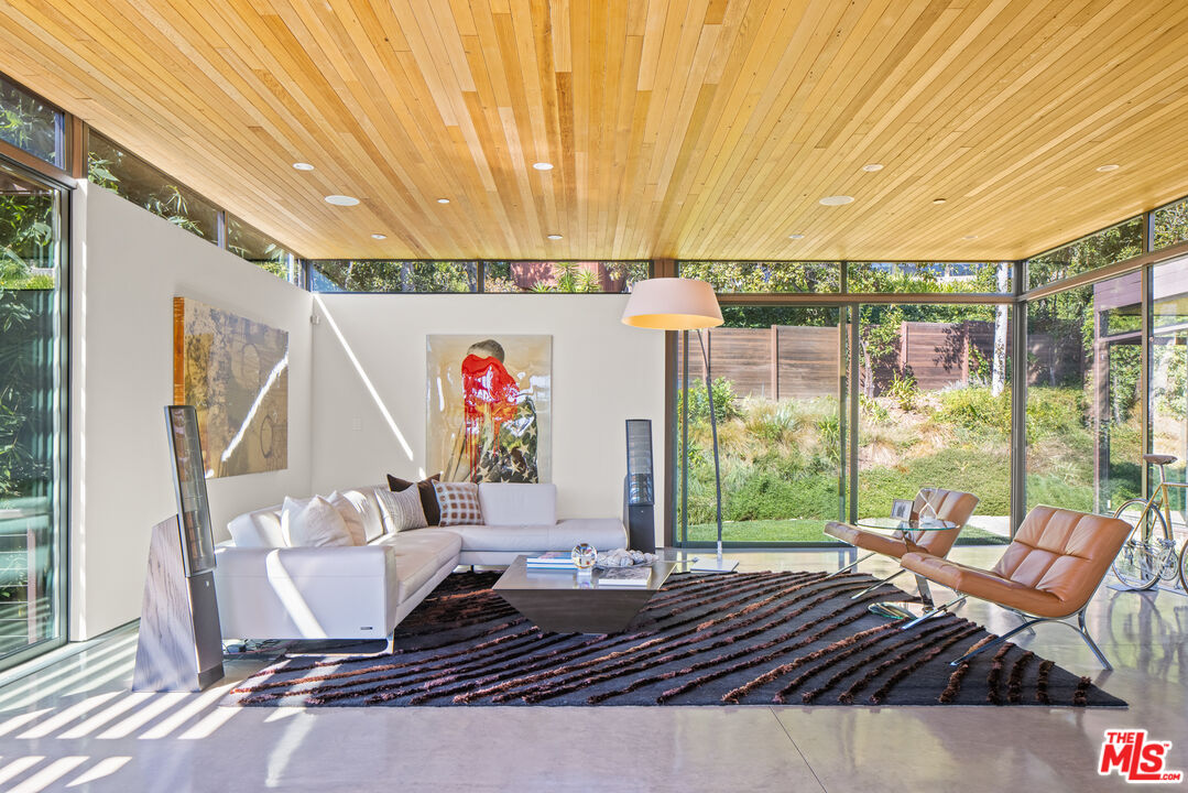 12321 Rochedale Lane Los Angeles, CA 90049 - Photo 18 of 46 a outdoor space with chairs