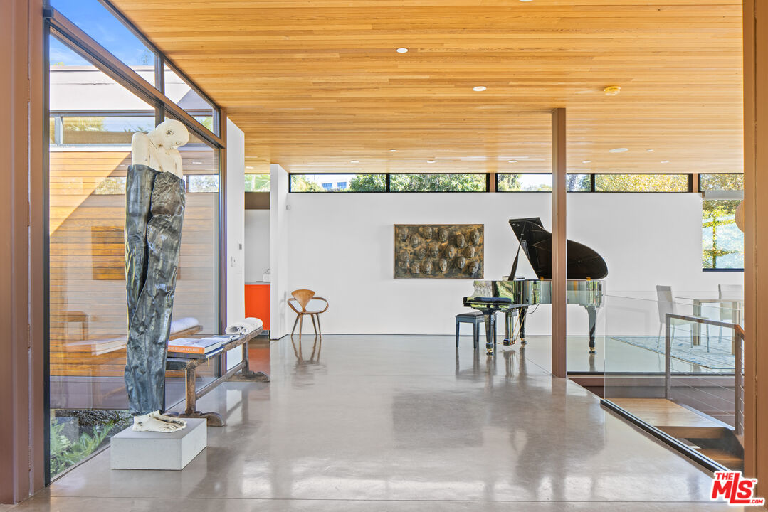 12321 Rochedale Lane Los Angeles, CA 90049 - Photo 19 of 46 a living room filled with furniture
