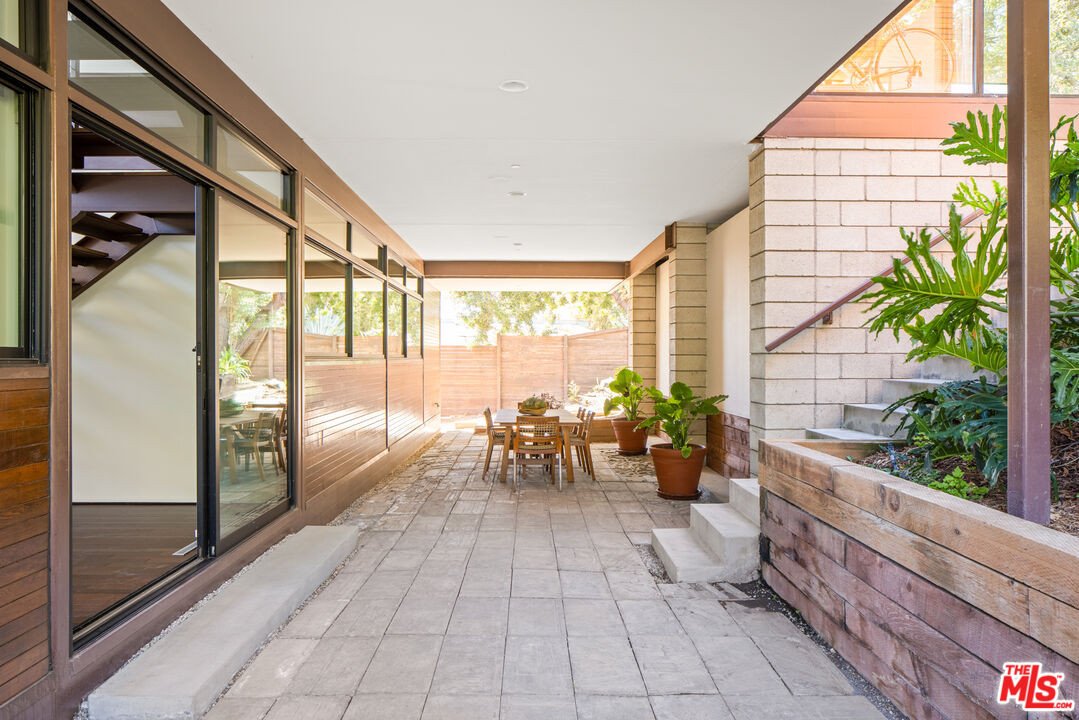 12321 Rochedale Lane Los Angeles, CA 90049 - Photo 25 of 46 a lobby with furniture and large windows