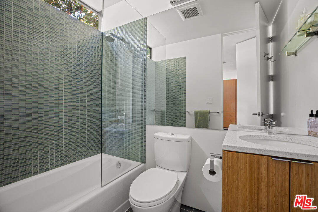 12321 Rochedale Lane Los Angeles, CA 90049 - Photo 33 of 46 a bathroom with a sink a toilet and a bathtub