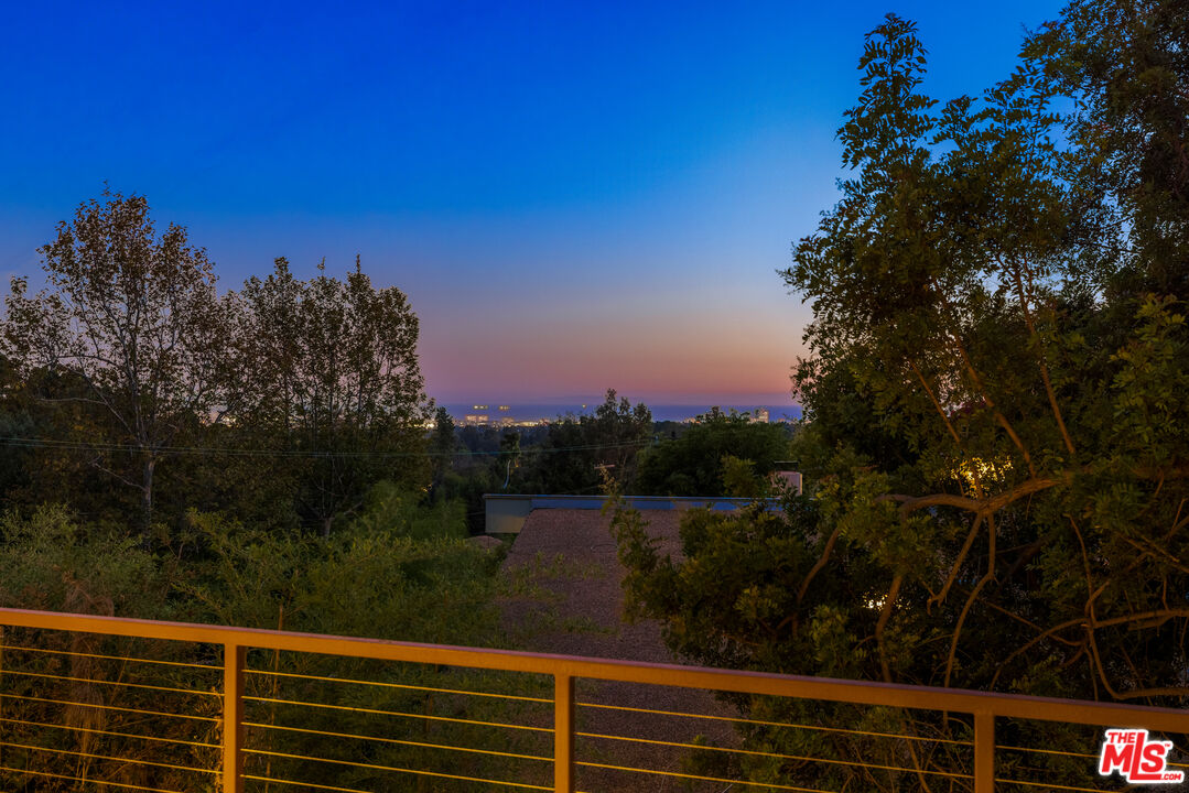 12321 Rochedale Lane Los Angeles, CA 90049 - Photo 41 of 46 a view of lake and mountain from a window